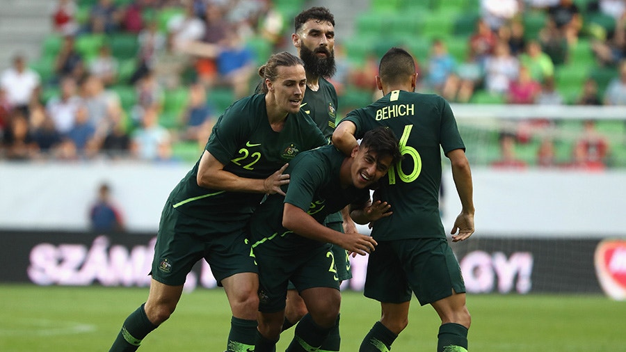 Daniel Arzani of Australia celebrates.