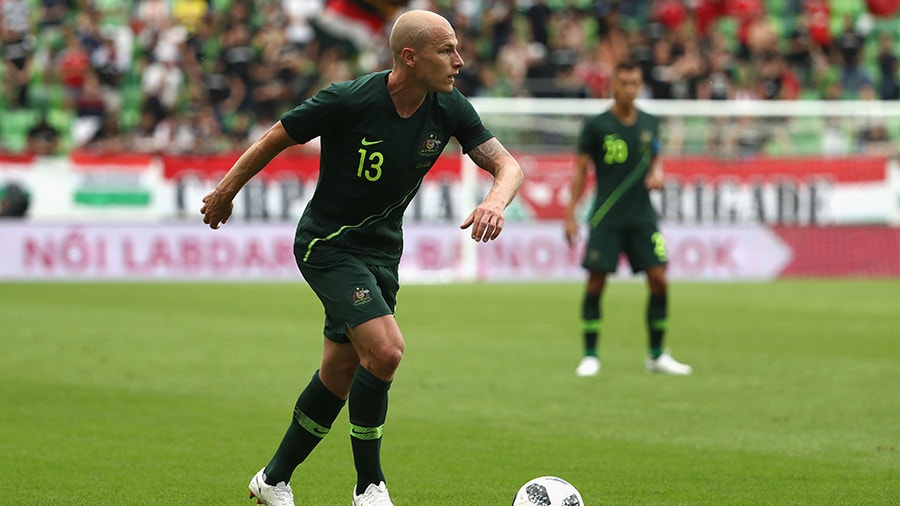 Aaron Mooy of Australia controls the ball.