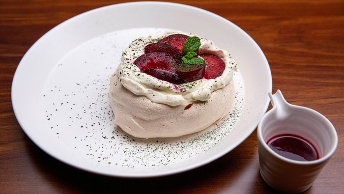 Pavlova with Vanilla Cream and Smoked Plums