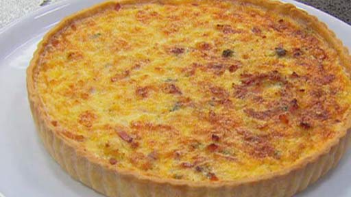 Classic Quiche Lorraine with green salad and vinaigrette