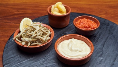 Patatas Bravas with Crispy Whitebait and Aioli