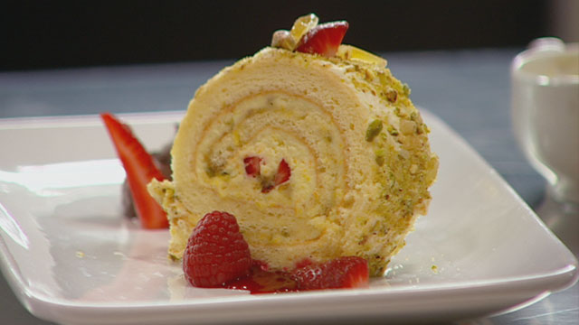 Swiss Roll with Cointreau Mascarpone, Pistachio Praline, Chocolate Ganache, Creme Anglise and Raspberry Coulis