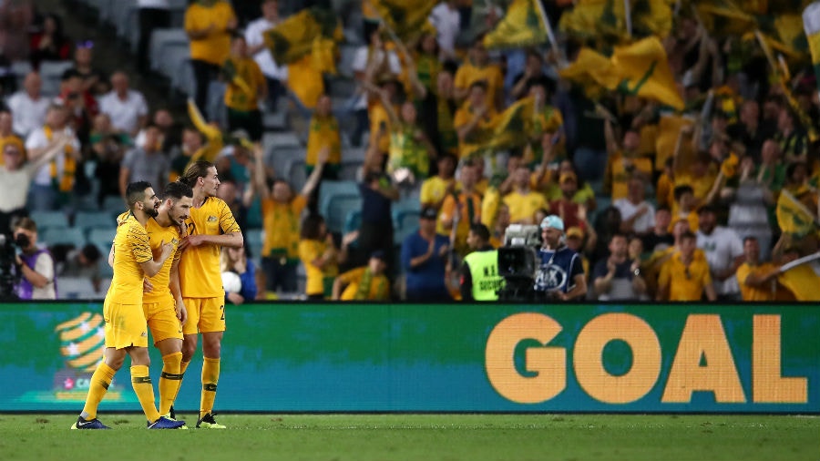 Matthew Leckie of Australia celebrates scoring a goal with team mates during the International Friendly Match