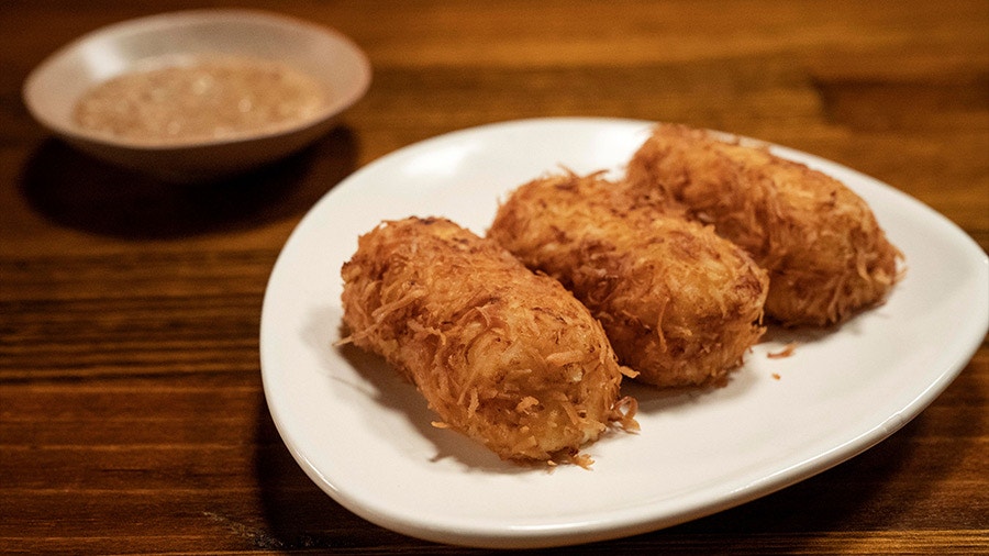 Crab Croquettes with Quail Egg and Peanut Sauce