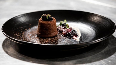 Chocolate Lava Cake with Vanilla Bean Ice Cream and Berry Coulis