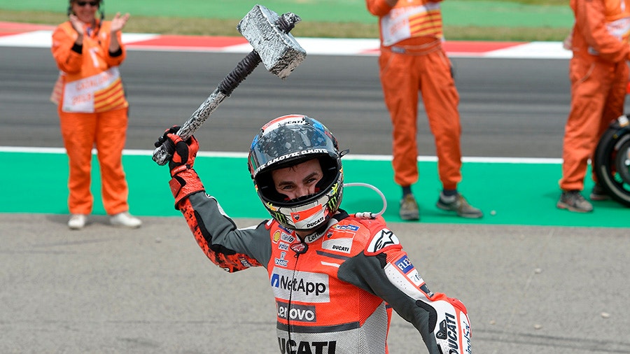 Ducati Teams Spanish rider Jorge Lorenzo celebrates after winning the Catalunya MotoGP Grand Prix race at the Catalunya race track.