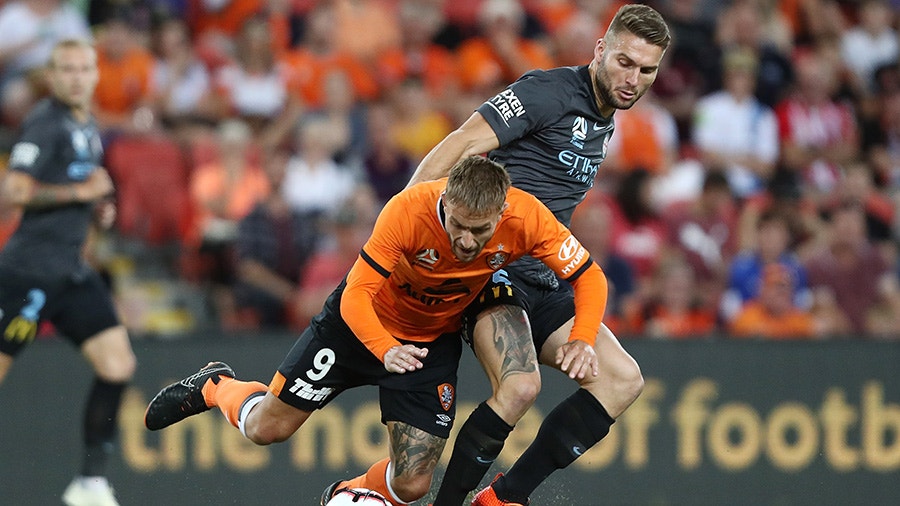 Adam Taggart of The Roar and Bart Schenkeveld of City FC.