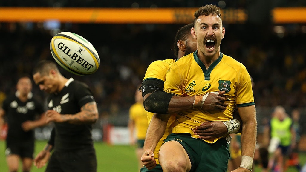 Nic White of the Wallabies celebrates a try