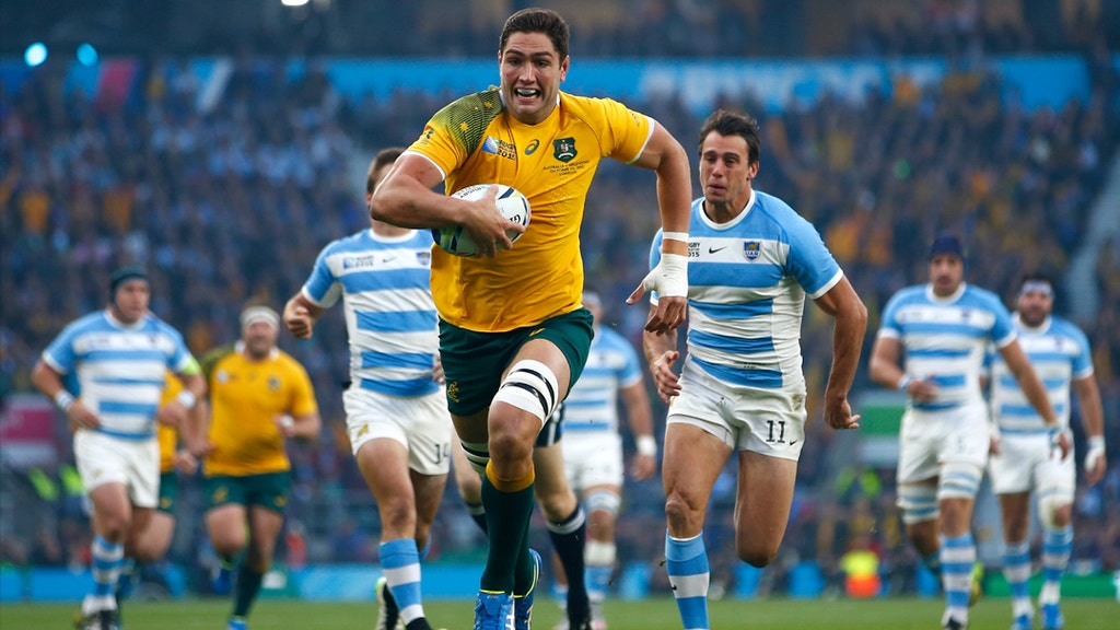 Rob Simmons of Australia races through to score