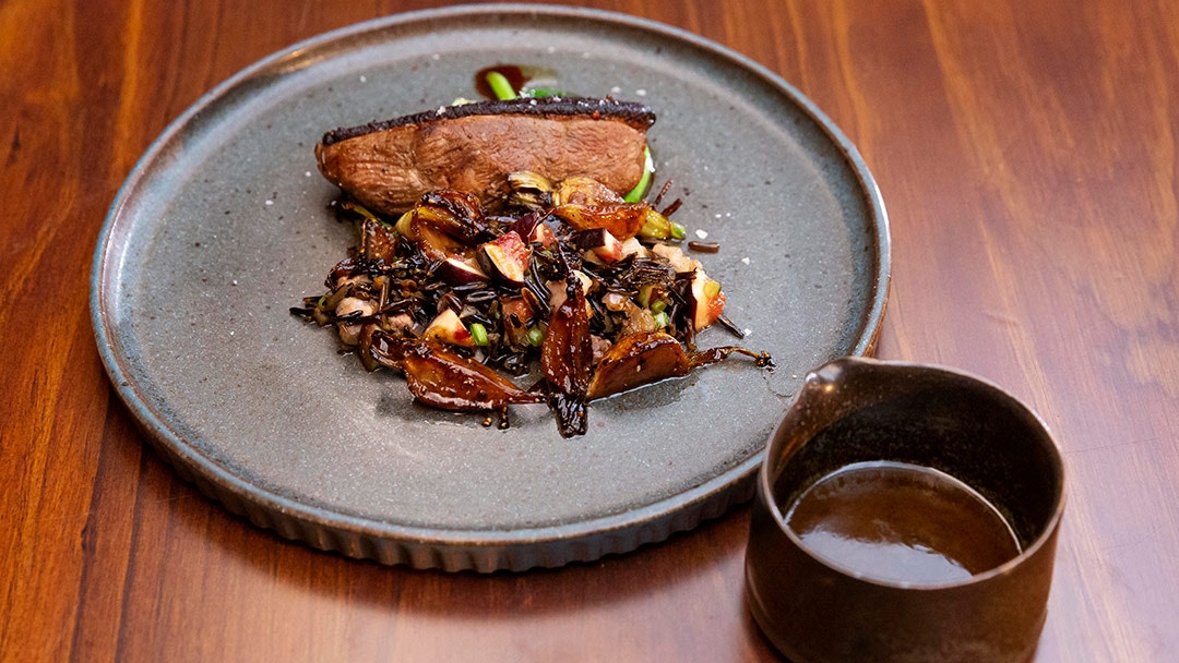 Duck with Wild Rice, Turnip Greens and Toasted Peanuts