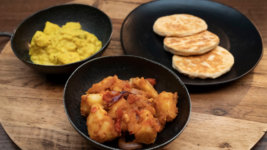 Yellow Potato Curry with Coconut Flatbread and Dry Potato Curry