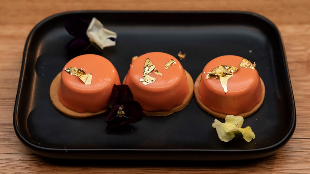 Mirror Glazed Carrot Mousse with Carrot and Ginger Jelly on a Biscuit Base