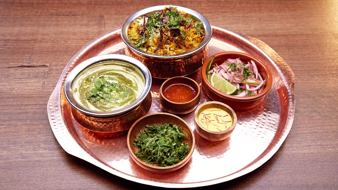 Chicken Biryani with Coriander Mint Raita and Onion Salad