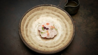Tomato Consommé with Tuna Tartare, Picked Daikon and Finger Lime