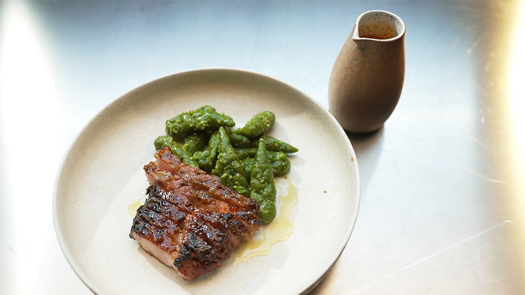 Parsley and Bread Gnocchi with Pork Chop, Smoked Tomato Broth