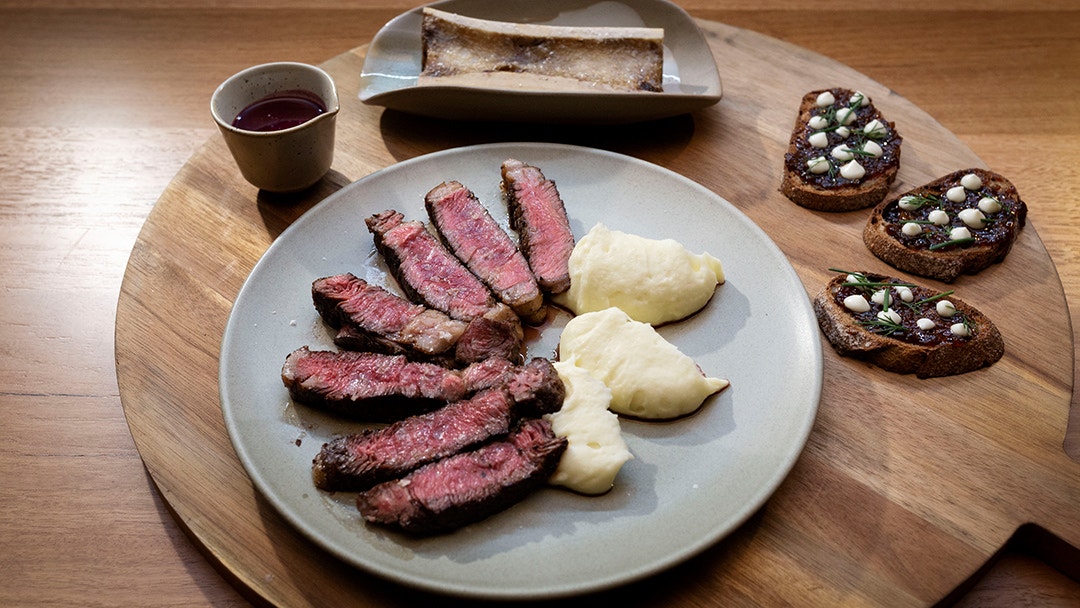 Scotch Fillet Au Poivre, Beurre Rouge, Purée Potatoes and Roasted Bone Marrow