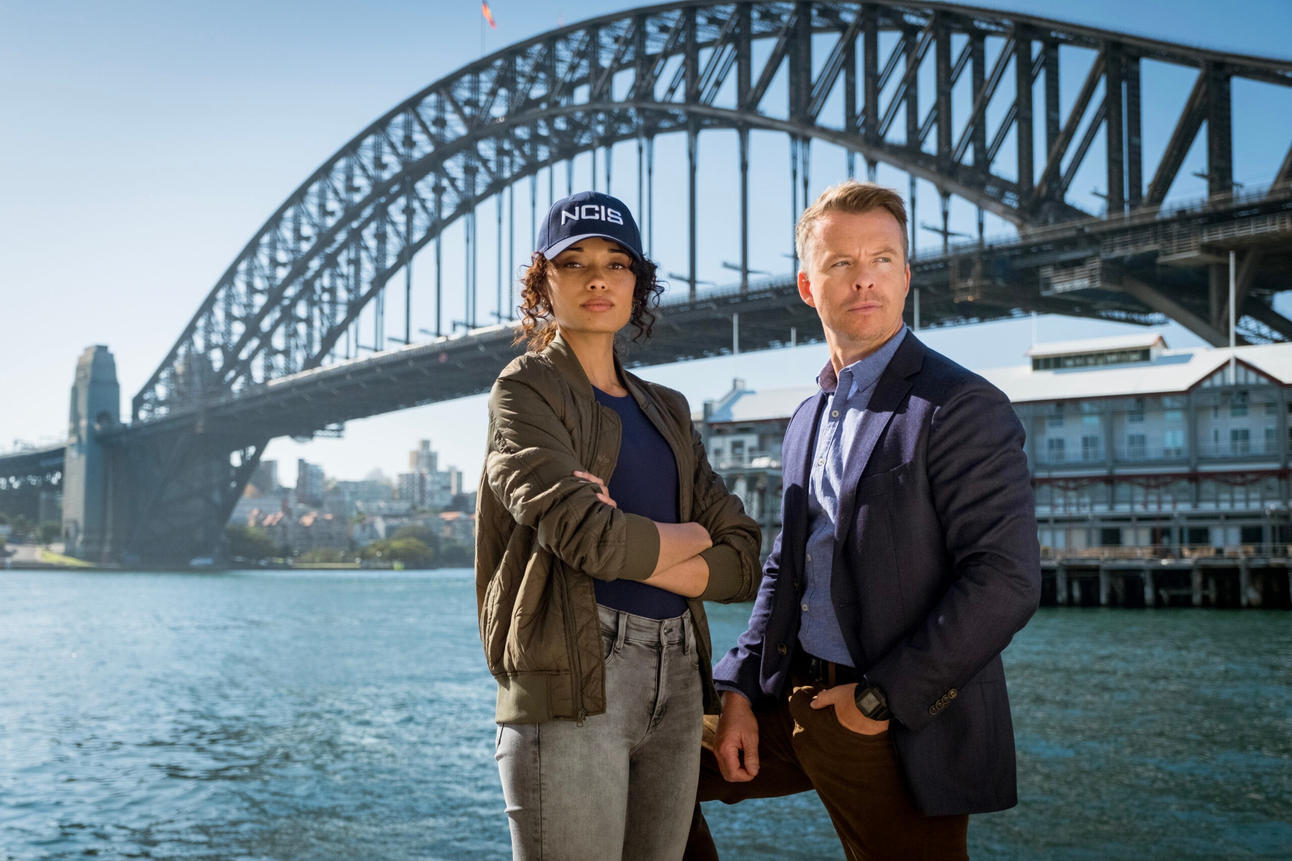 Olivia Swann as NCIS Special Agent Captain Michelle Mackey and Todd Lasance as AFP Liaison Officer Sergeant Jim  'JD' Dempsey, on the set of NCIS: Sydney season 1.