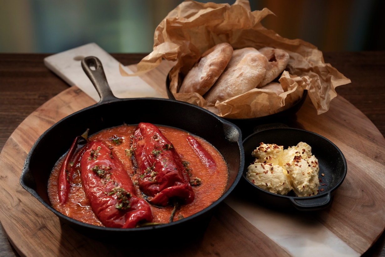 Stuffed Capsicums in Tomato Sauce, Bread and Kajmak Dip