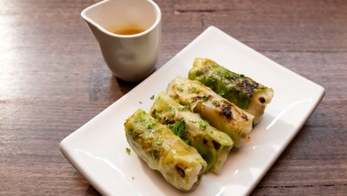 Spatchcock, Pineapple and Turnip Cabbage Rolls with Baby Mandarin Sauce