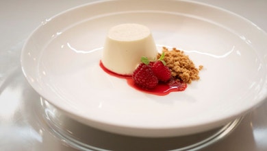 Vanilla and Honey Panna Cotta with Crumb and Raspberry Coulis
