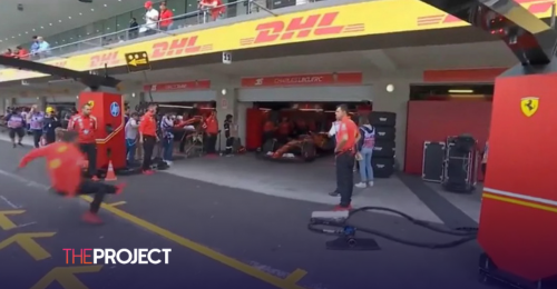 Ferrari Mechanic Takes A Tumble In Front Of Charles Leclerc