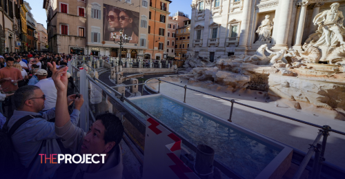 Tourists Toss Coins Into Makeshift Pool As Trevi Fountain Undergoes Maintenance