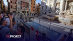 Tourists Toss Coins Into Makeshift Pool As Trevi Fountain Undergoes Maintenance