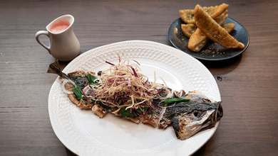 Mackerel With Ooray Plum Emulsion, Crispy Yams and Saltbush Damper, Pickled Onions, Warrigal Greens and Sunrise Lime